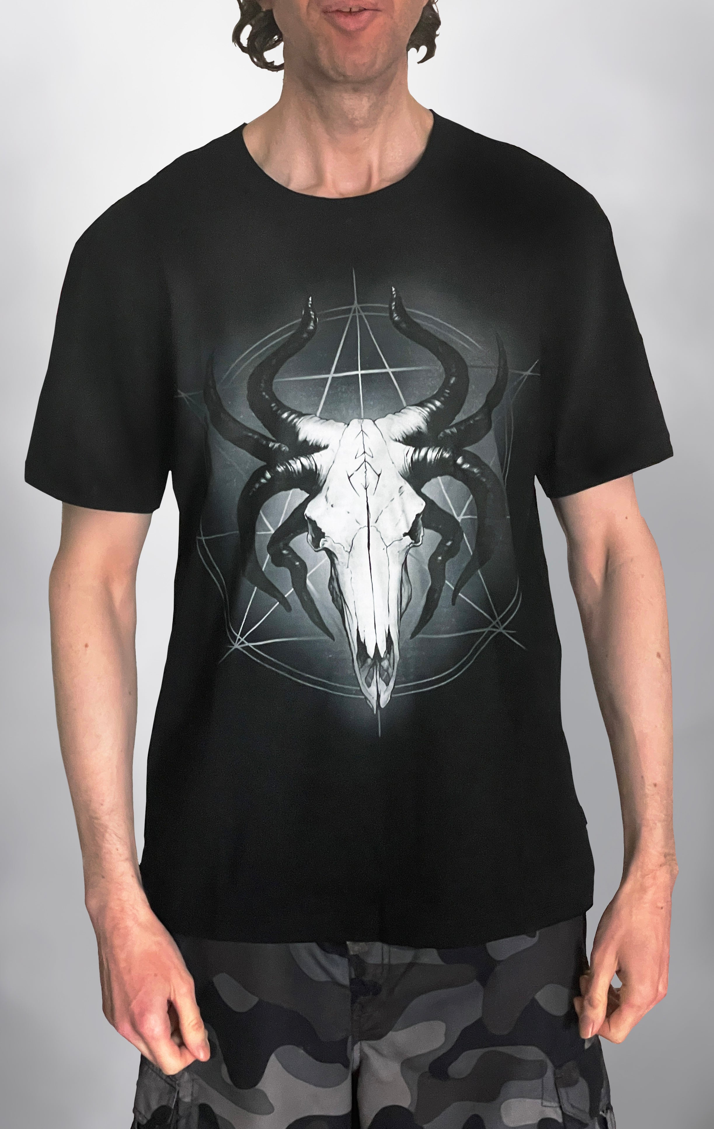 Glowing God of the Void: The Horned Skull Deity T-Shirt